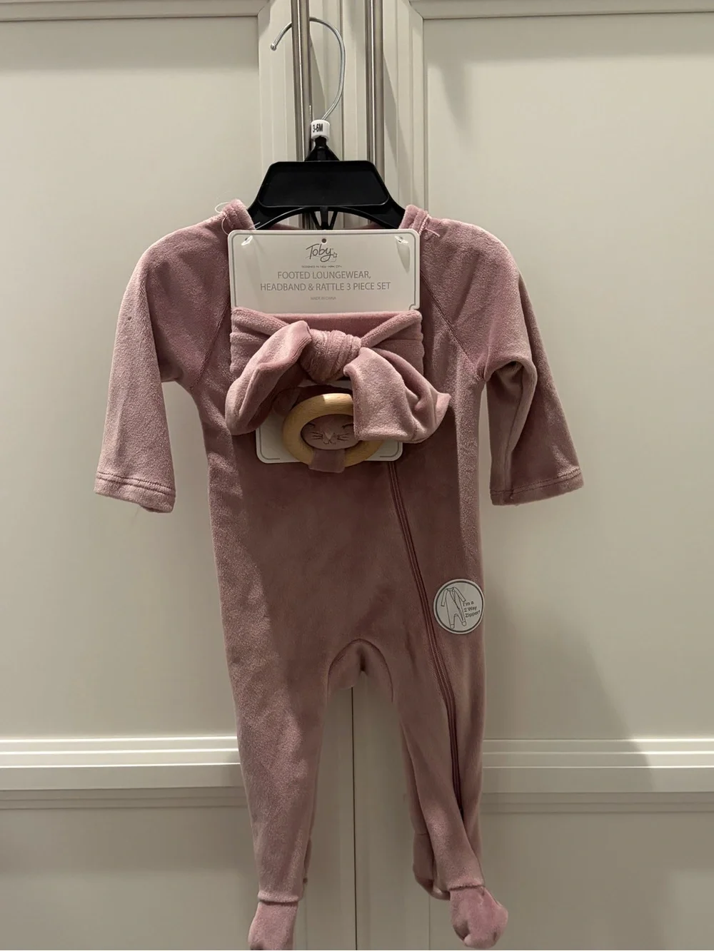 Toby Designed in NY City, Footed One-Piece with Headband & Rattle Dusty Rose